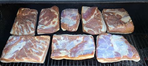 Started smoking 20 lbs of pork belly cured for a week | Scrolller
