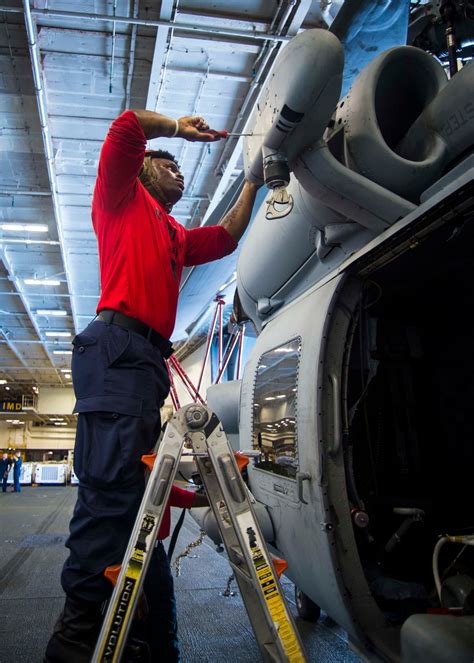 DVIDS Images Sailor Conducts Helicopter Maintenance Image 1 Of 4