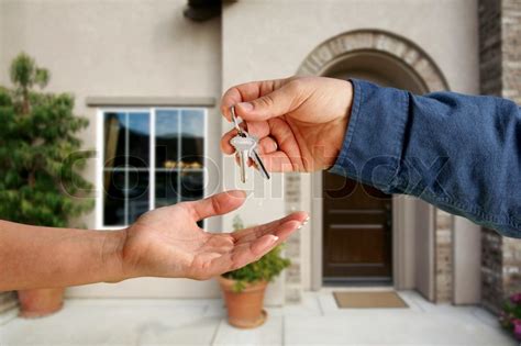 Handing Over The House Keys In Front Of Stock Image Colourbox