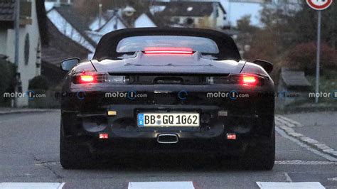 Upcoming Porsche Boxster Ev Spotted Charging Via Rear Port