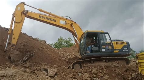 Hyundai Hx210s Excavator Loading Truck Youtube