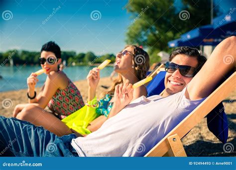 Woman And Man Eating Ice Cream On Beach Stock Image Image Of Sand