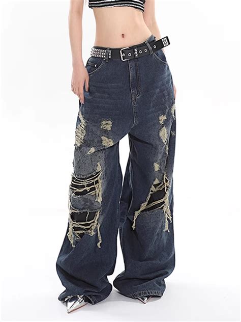 Large Silhouette Hole Denim Pants Eluva