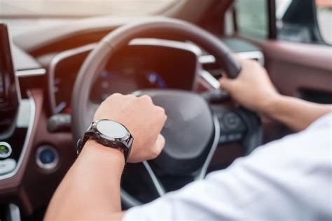 Premium Photo Man Driver Driving A Car On The Road Hand Controlling