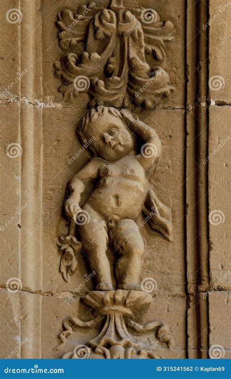 Small Naked Cherub With Floral Ornamentation Stock Photo Image Of