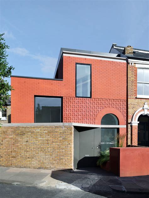 3144 Architects Adds Contemporary Red Brick House To Traditional