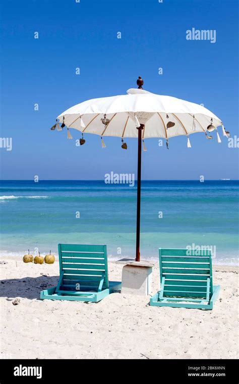 White Beach Umbrella And Green Sunbed Gili Trawangan Island Indonesia