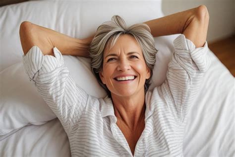 Premium Photo Happy Mature Woman In Morning In Bed At Home Good Carefree Morning