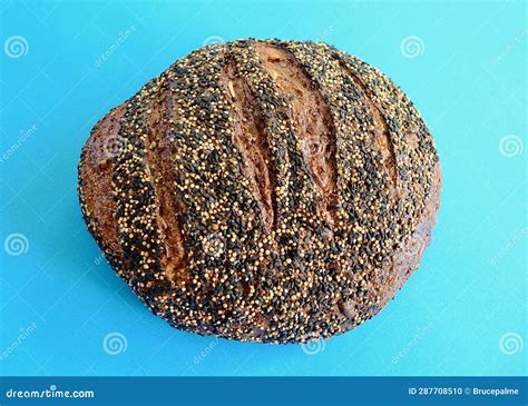 A Closeup Of A Loaf Of Ancient Grain Sourdough Miche Bread Stock Photo