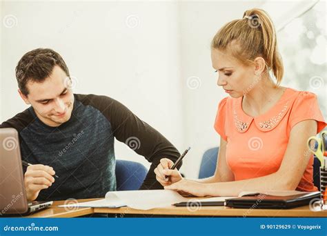 Two Students Talking in Classroom Stock Image - Image of chatting, young: 90129629