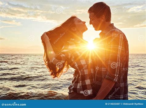 A Couple Holding Hands During An Sunset Stock Image Image Of Beach