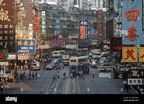 Main Street Hong Kong Island With Trams And Buses S Stock Photo Alamy