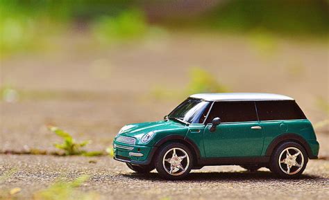 Royalty-Free photo: Green Mini Cooper scale model | PickPik