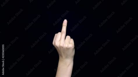 Hand Sign Showing Middle Finger In Rude Way Meaning Fuck Off Isolated On Black Background