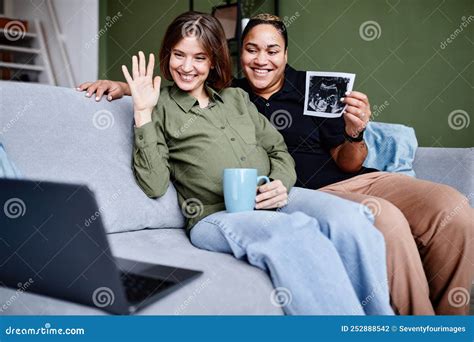 Gay Couple Baby Announcement Stock Photo Image Of Sofa Maternity