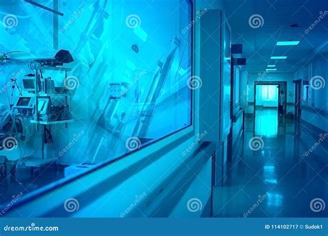 Hospital Hallway with Observation Window To the Ward with Reflecting Equipment and Silhouette of ...