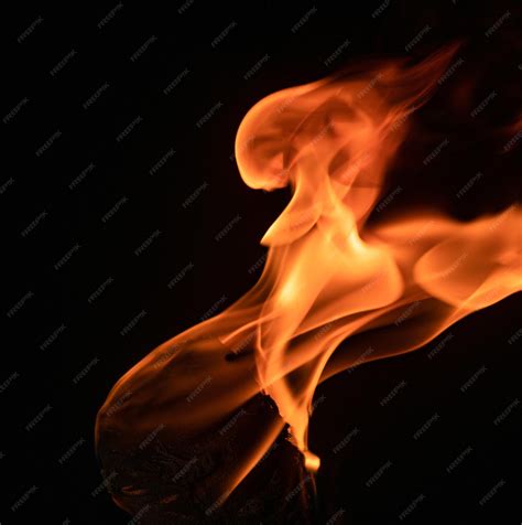 Premium Photo Torch Fire Texture On Black Background