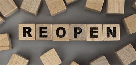 The Word Reopen Made From Wooden Cubes Conceptual Photo Stock Photo