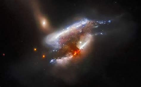 Hubble Space Telescope Captures Mind Boggling Image Of Three Galaxies Merging Techeblog