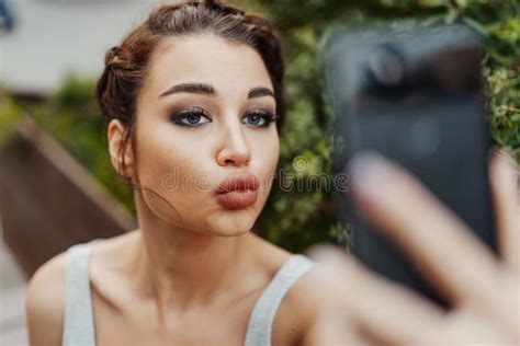 Close Up Of Beautiful Woman Making Selfie At Park And Smiling Stock