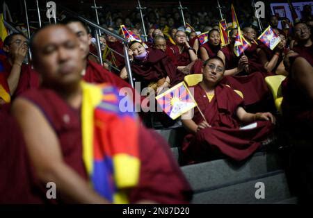 Exiled Tibetan Buddhist Monks Listen To The Prime Minister Of The