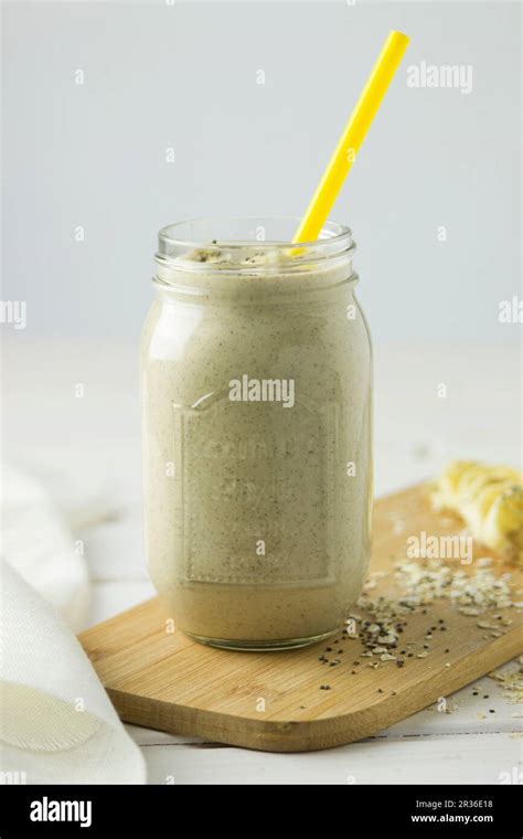 Banana Smoothie With Oats And Chia Seeds Stock Photo Alamy