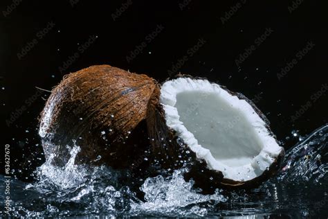 cracked coconut Stock Photo | Adobe Stock