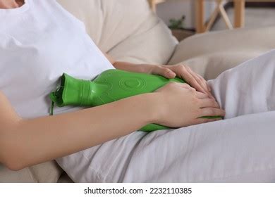 Woman Using Hot Water Bottle Relieve Stock Photo 2232110385 Shutterstock