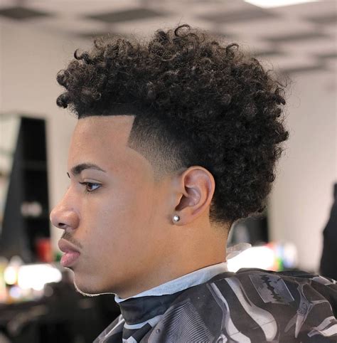 22 Stylish Haircuts For Men 2024 Trends Taper Fade Haircut Boys With Curly Hair Curly Hair