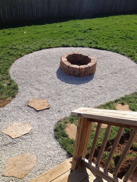 My backyard firepit with seating area. Stones from Lowes $2.25 a piece, need 30 and 2 bags of ...