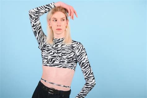 Premium Photo Youth Transgender Lgbt Looking At Camera While Posing Isolated Over Nude Color