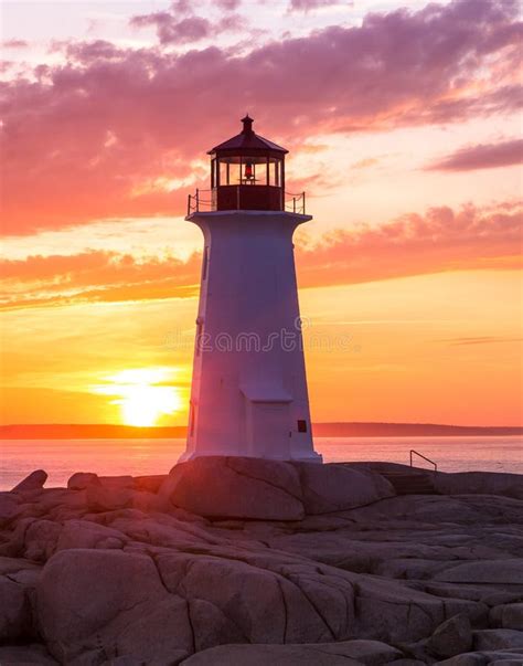 Peggy S Cove Lighthouse During A Vibrant Sunset Atlantic Coast Nova