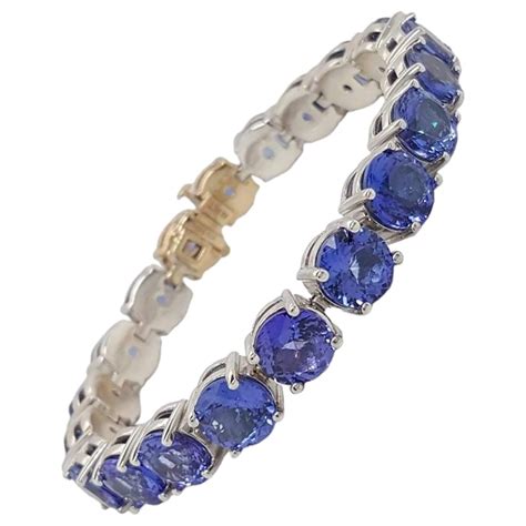 16 Carat Blue Topaz Bracelet Tennis Line Estate 14K Gold Trillion Cut