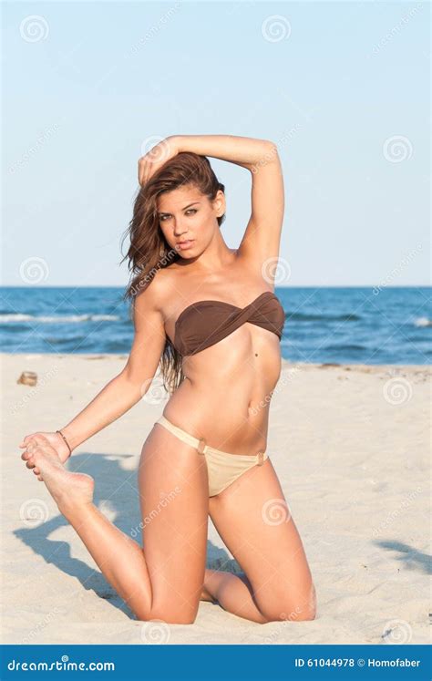 Beautiful Bikini Model Posing On The Beach Stock Photo Image