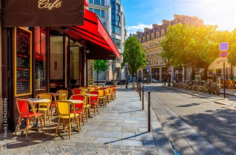 Cozy Street With Tables Of Cafe In Paris France Stock Photo Adobe Stock