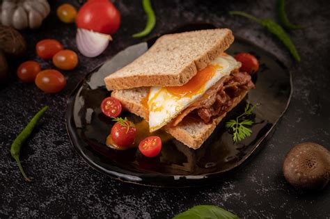 Ham and egg breakfast sandwich 1826815 Stock Photo at Vecteezy