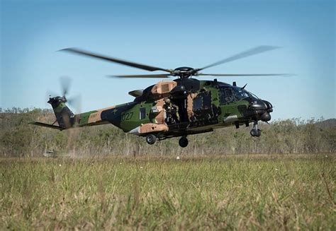 An Australian Army Mrh 90 Helicopter From Battlegroup Griffin Lands To Pick Up Vip Passengers At