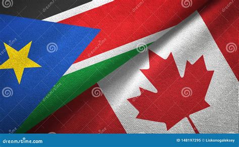 South Sudan And Canada Two Flags Textile Cloth Fabric Texture Stock