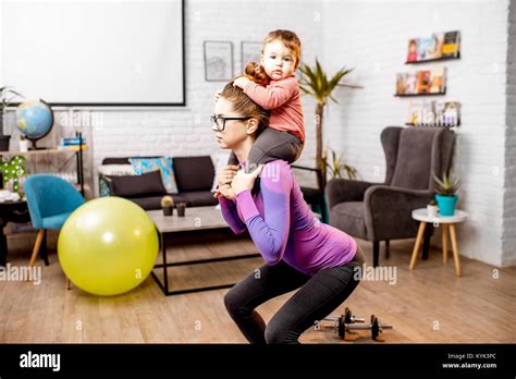 Mother Doing Sports With Her Baby Son Stock Photo Alamy