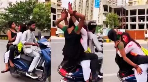 Holi Video Viral As Girls Perform Obscene Act On Moving Scooter Noida Police Issue Fine Holi