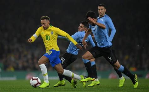 Neymar Da Silva Santos J Nior Of Brazil Is Tackled By Lucas Torreira