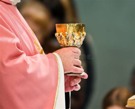 Hands Of The Priest Consecrate Wine And Bread On The Altar Of Holy Mass Stock Image Image Of