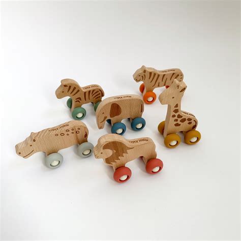 Wildlife Wooden Animals With Rubber Wheels Common Circus