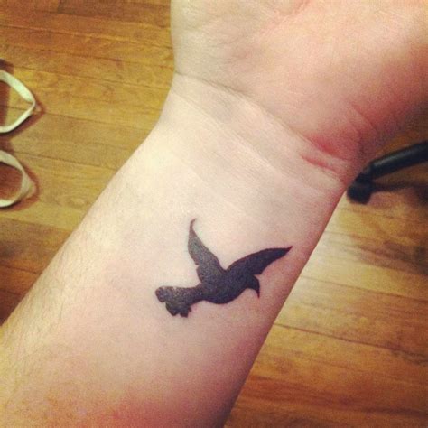 Dark Black Little Crow Bird Tattoo Design Bird Silhouette Tattoos