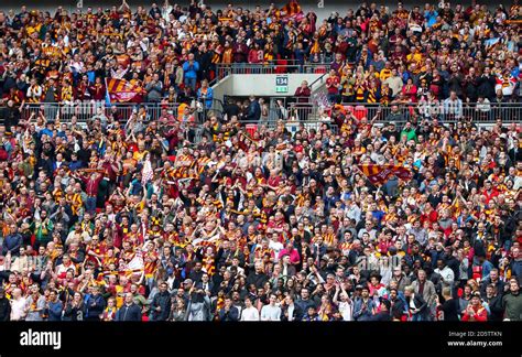 Bradford City fans in the stands Stock Photo - Alamy