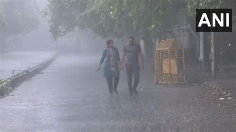 In Pics Rainfall In Parts Of Delhi Ncr Brings Respite From Scorching Heat