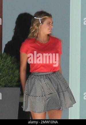 Model Kate Upton Appeared To Have Some Trouble With Her Skirt During A