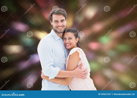 Composite Image Of Attractive Young Couple Hugging And Smiling At