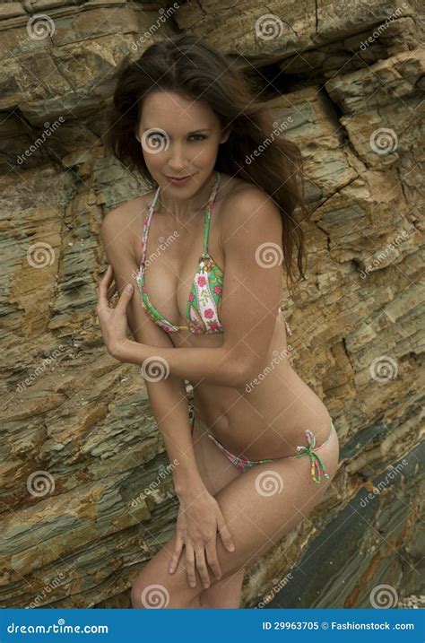 Attractive Brunette Girl Posing In Brazilian Bikini Stock Photo