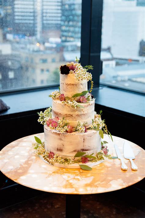 Beautiful September Nearly Naked Wedding Cake Decorated With Wild